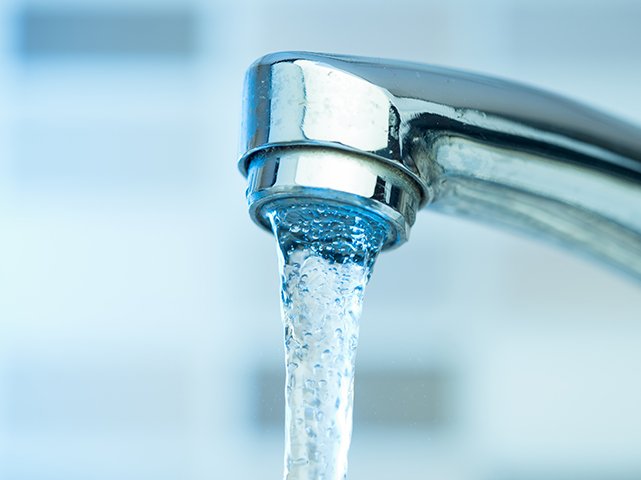 Image of a tap with running water