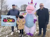 Councillor Scott and Mayor Leduc with unicorn mascot