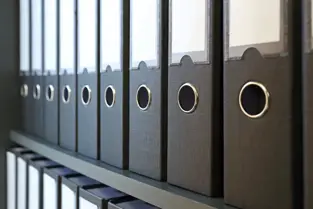 Shelf of binders