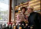 Two liquor sales business owners looking at a tablet