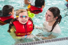 counsellor and swimmer in pool