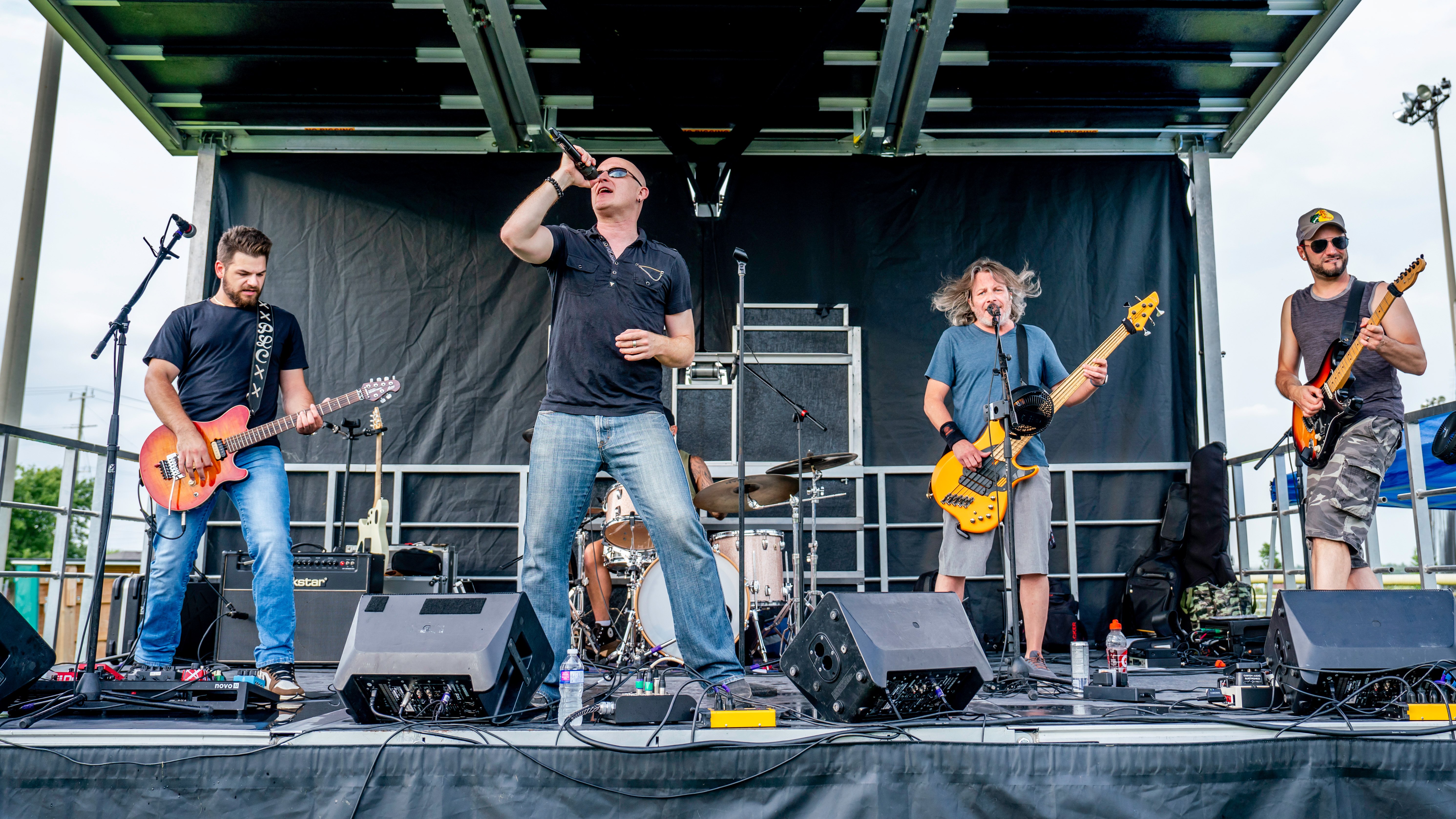 Image of band on stage at Music in the Park
