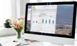 Desktop computer with the water consumption portal on the screen.