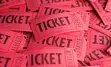 A background of a pile of tickets